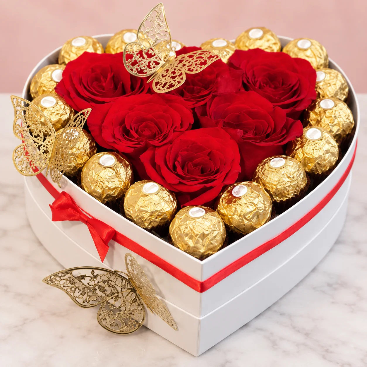 Caja corazón con rosas y chocolates